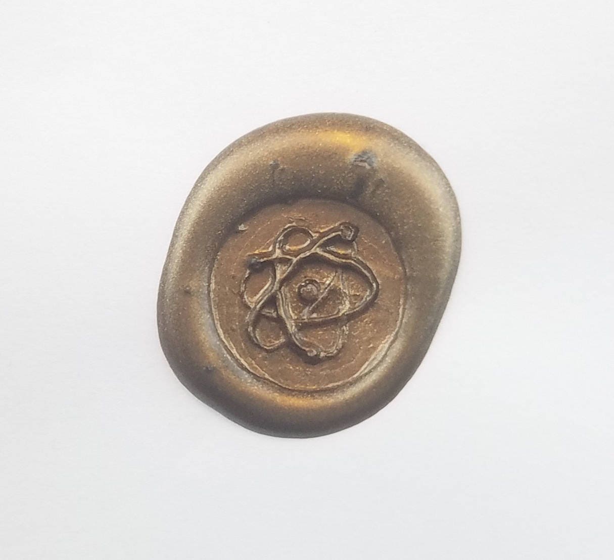 The power of the atom wax seal signet ring