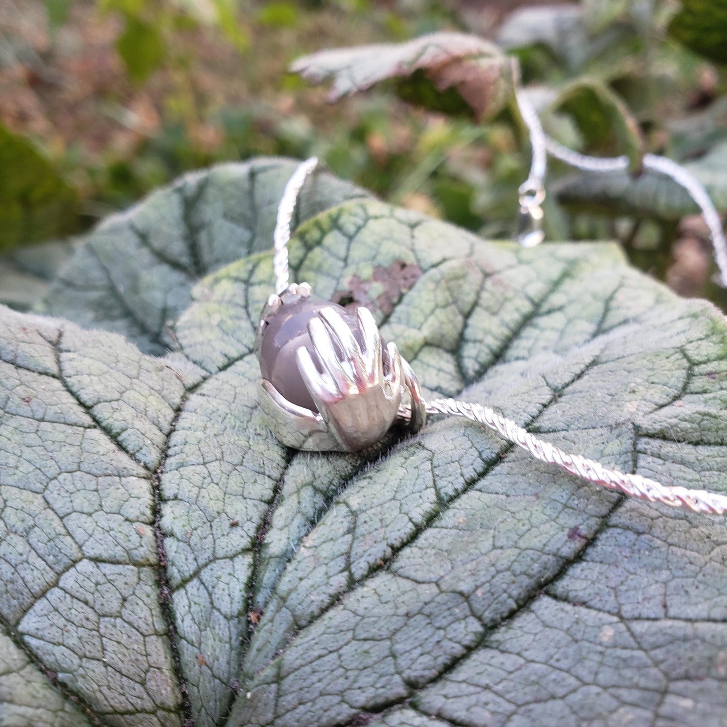 spreading moon moonstone pendant