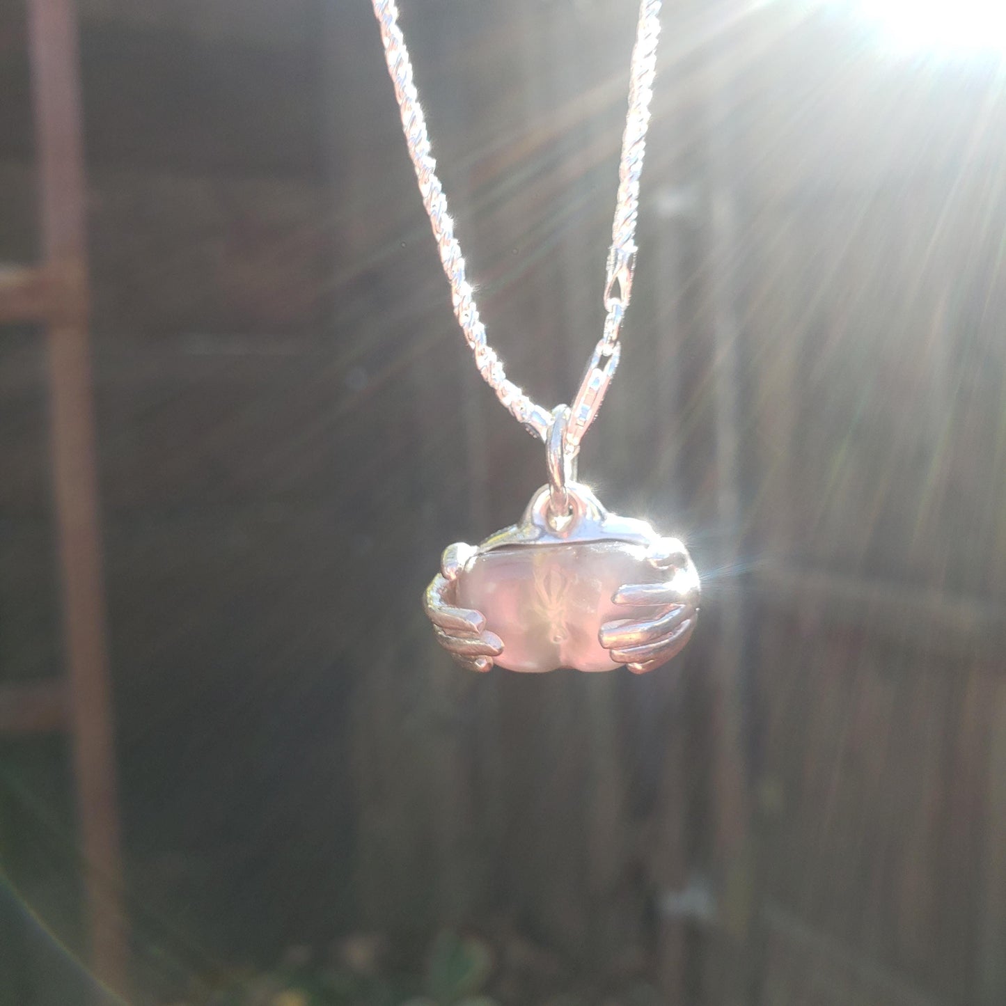 spreading moon moonstone pendant