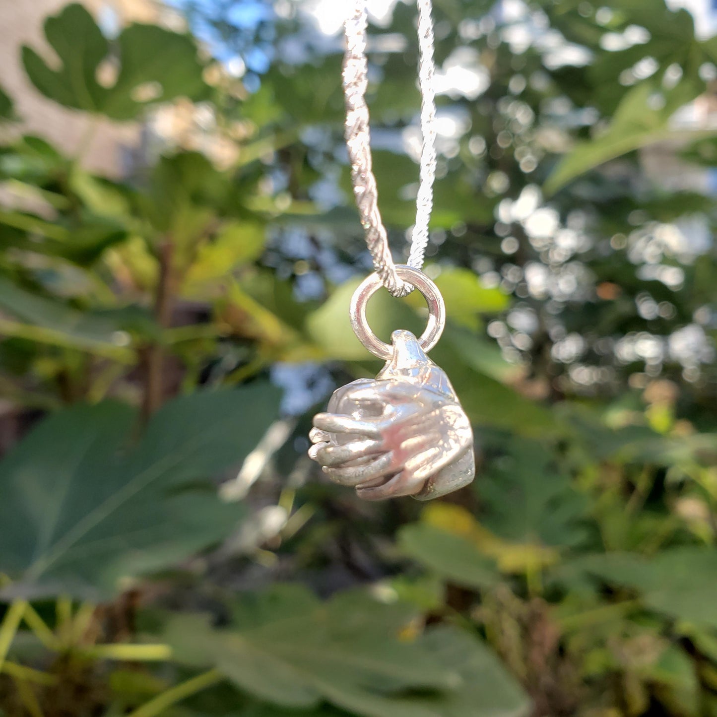 spreading moon moonstone pendant