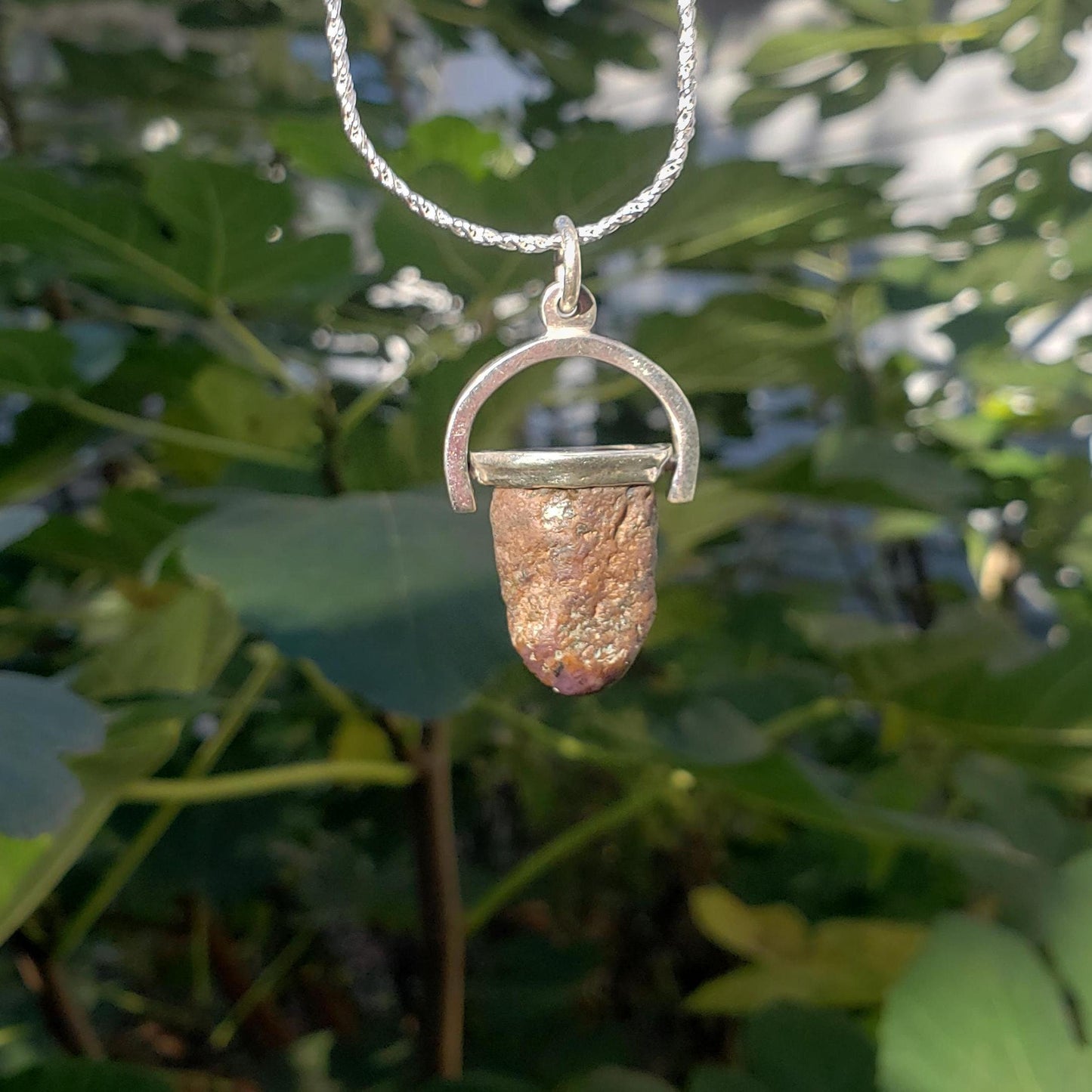 raw star ruby witch tower pendant