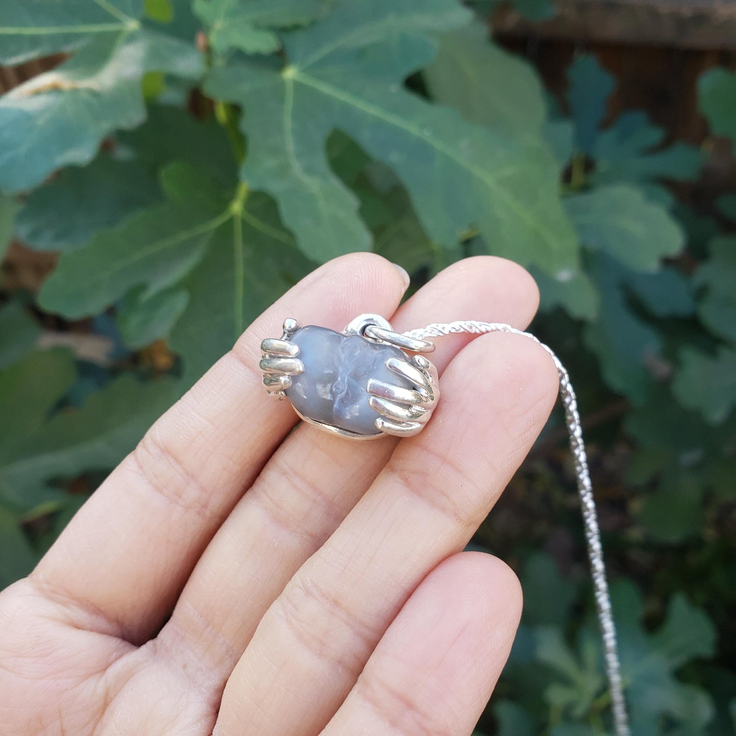 spreading moon moonstone pendant