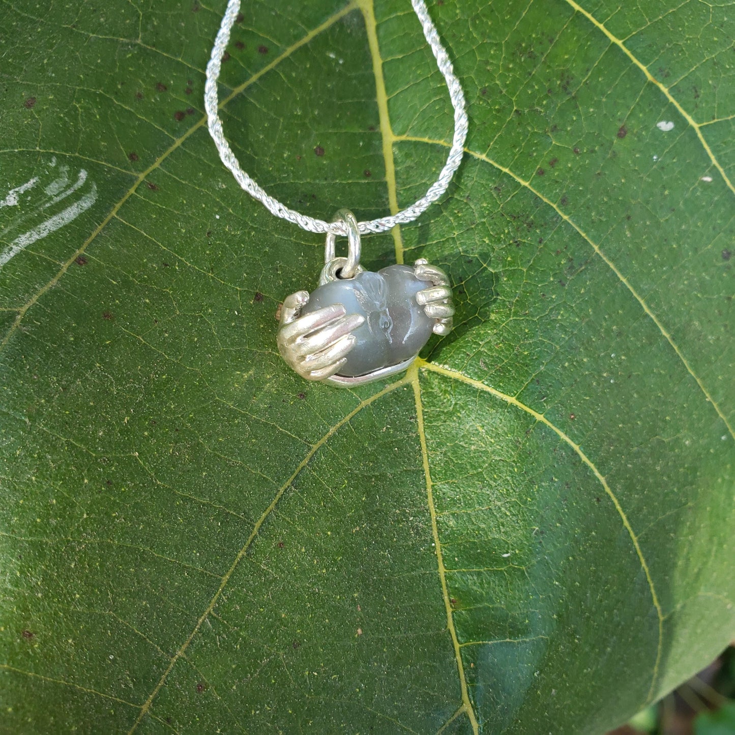 spreading moon moonstone pendant