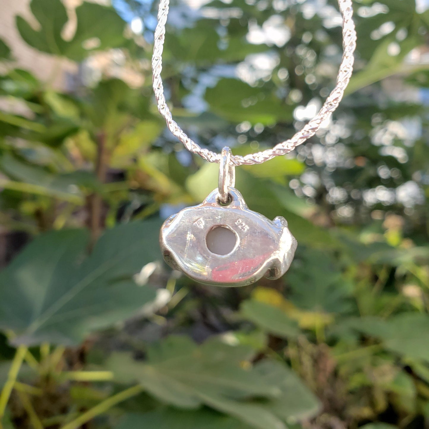 spreading moon moonstone pendant