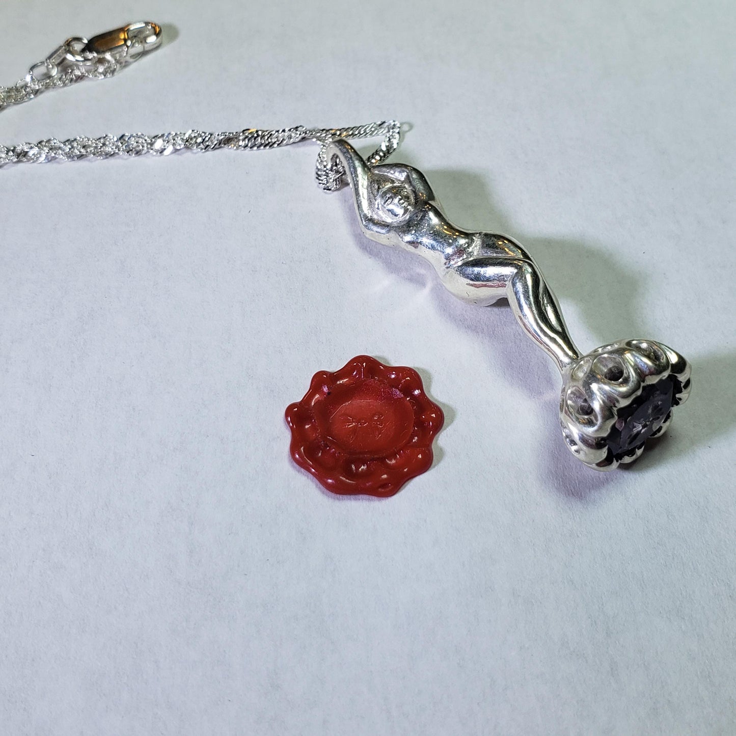 amethyst bow stamp figurine pendant