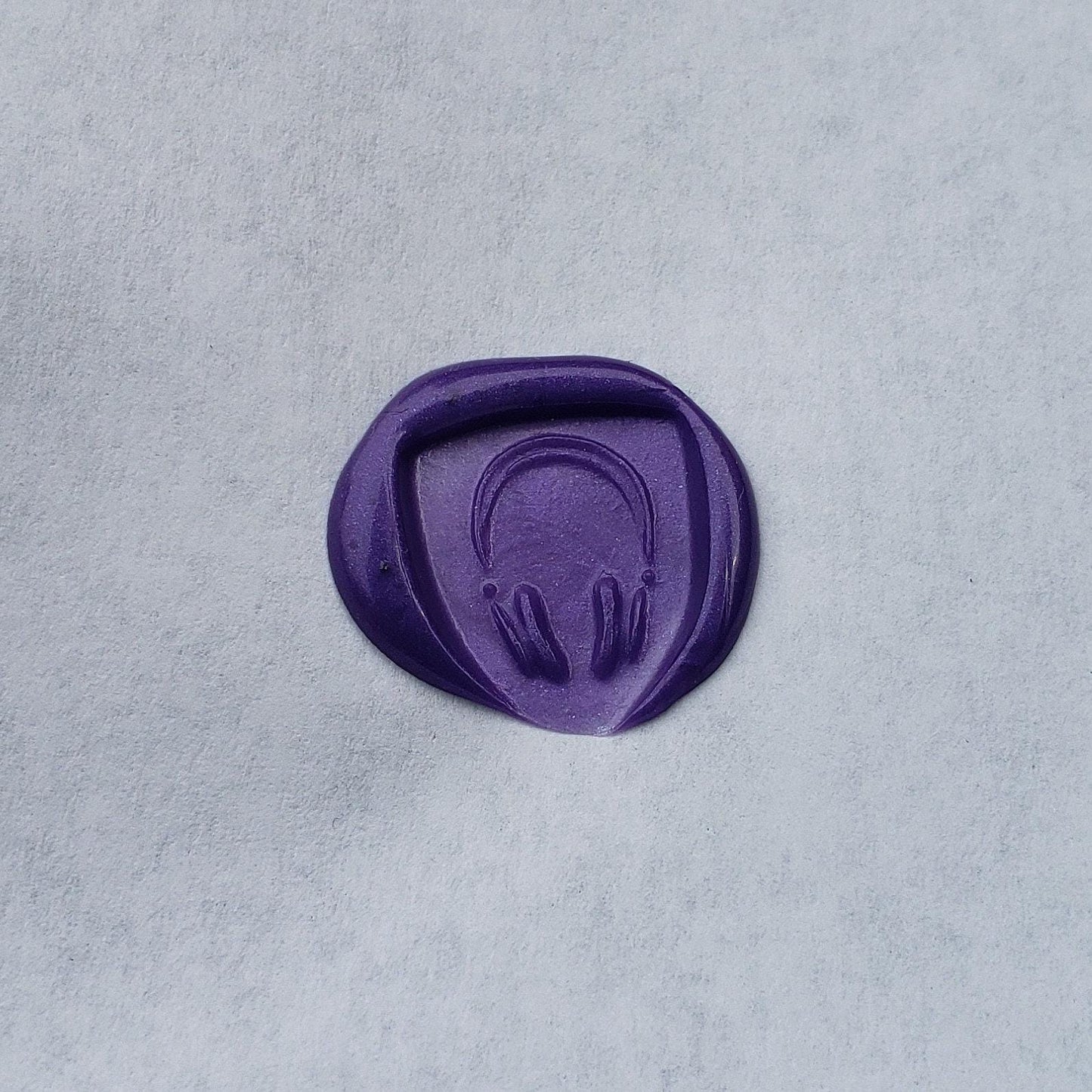 Headphones wax seal signet ring