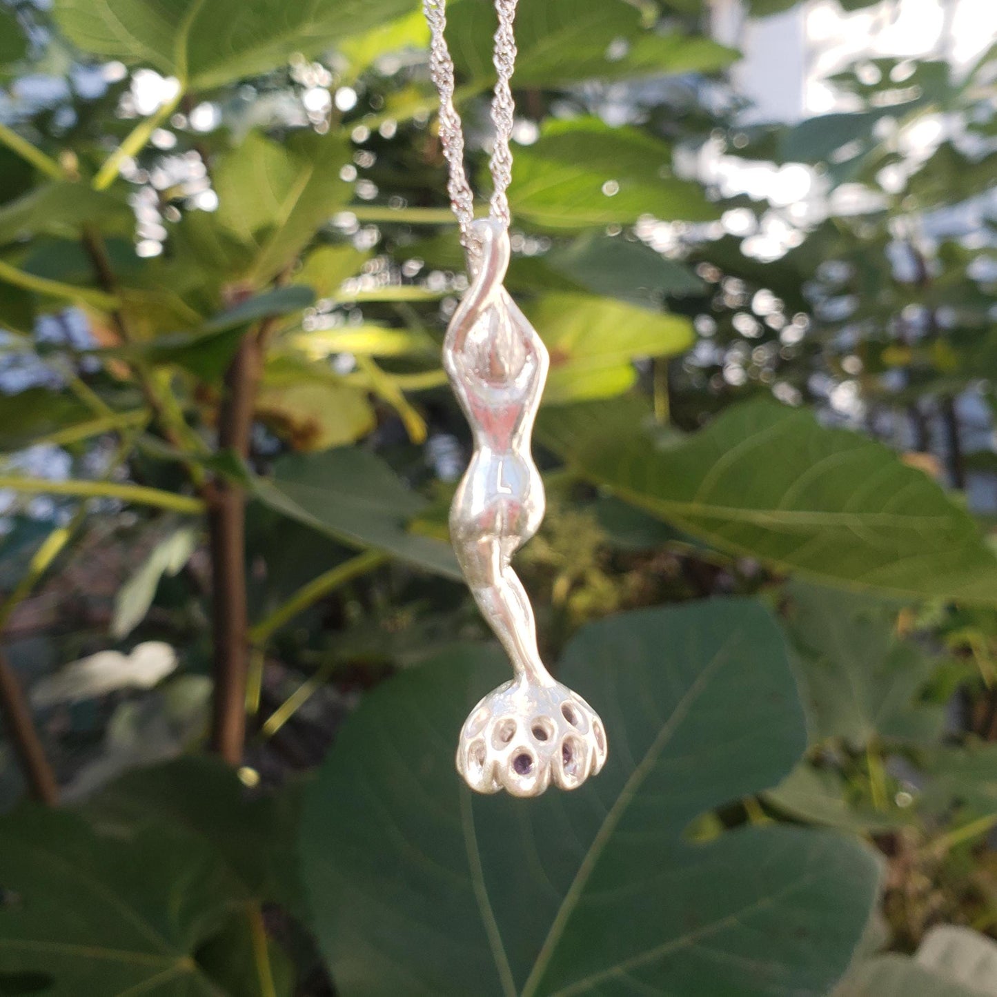 amethyst bow stamp figurine pendant