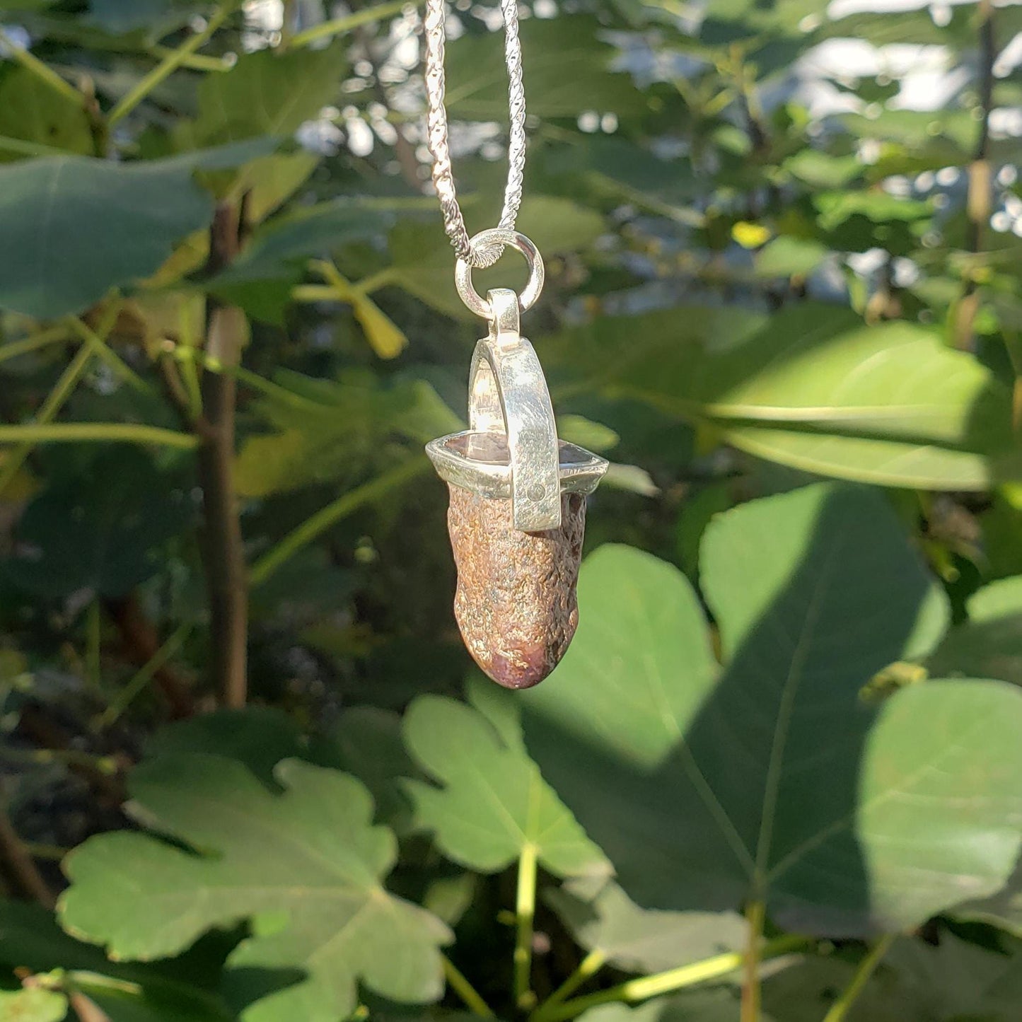 raw star ruby witch tower pendant