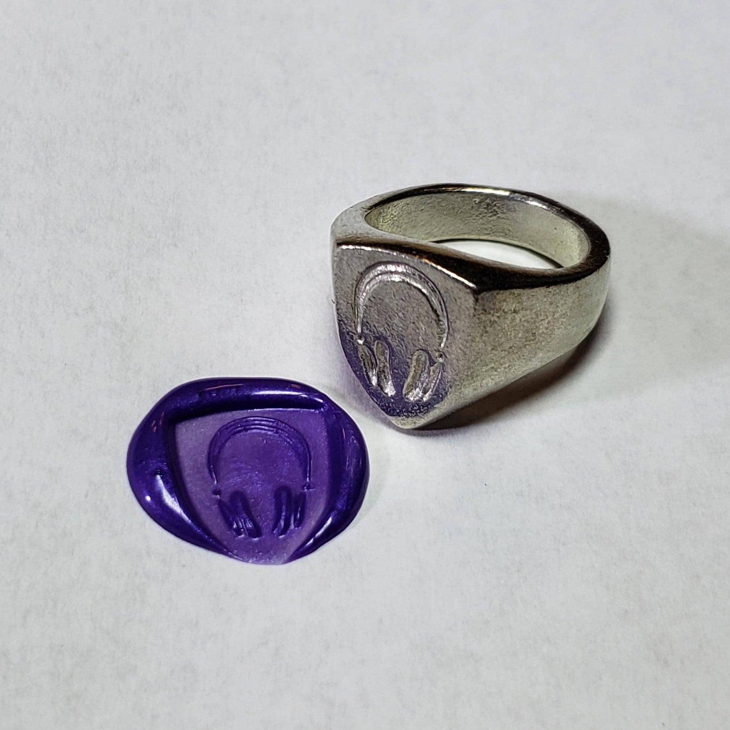 Headphones wax seal signet ring