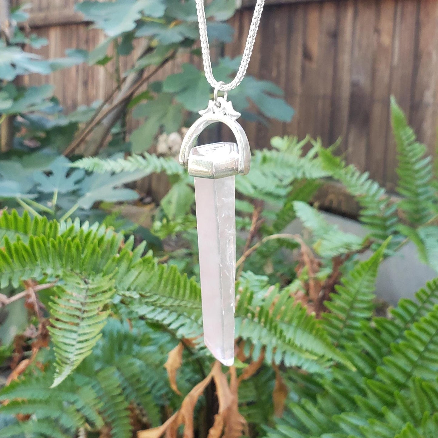 quartz tower moon dance stamp pendant