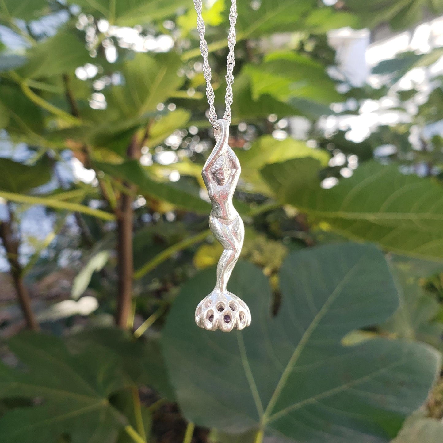 amethyst bow stamp figurine pendant