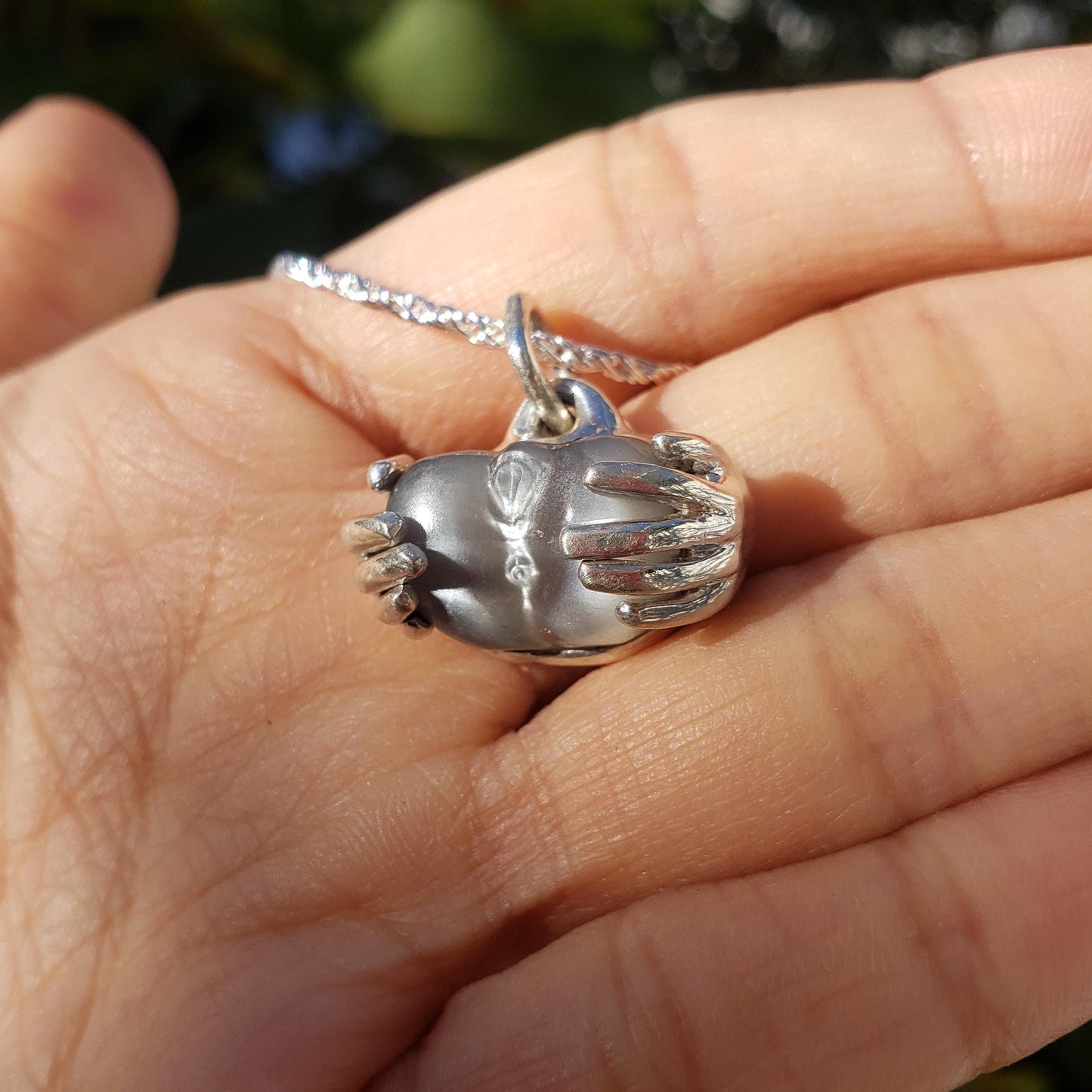 spreading moon moonstone pendant