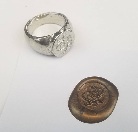 The power of the atom wax seal signet ring