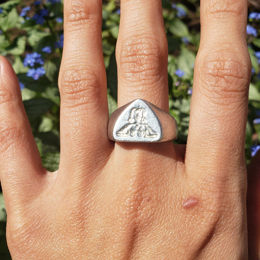 Between boobs wax seal signet ring