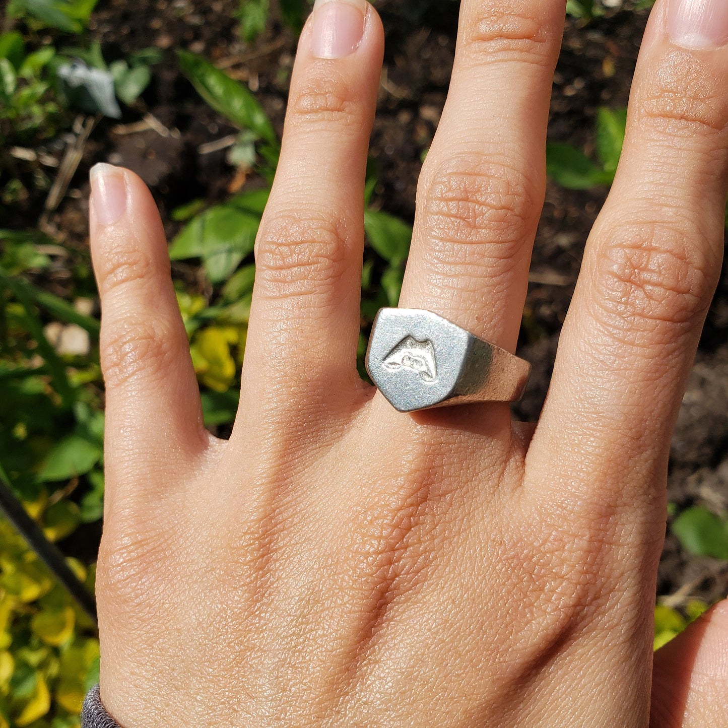 Lip biting wax seal signet ring