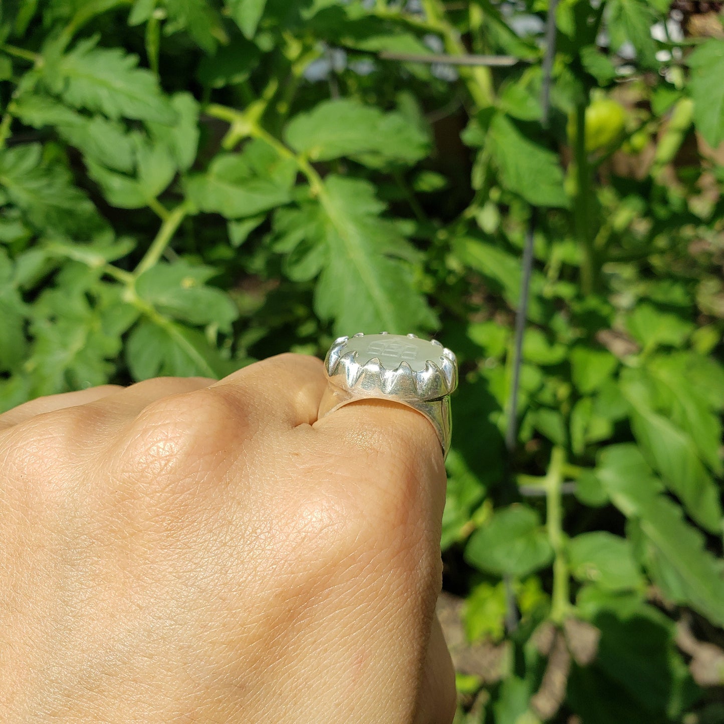 Jade birdcage silver ring