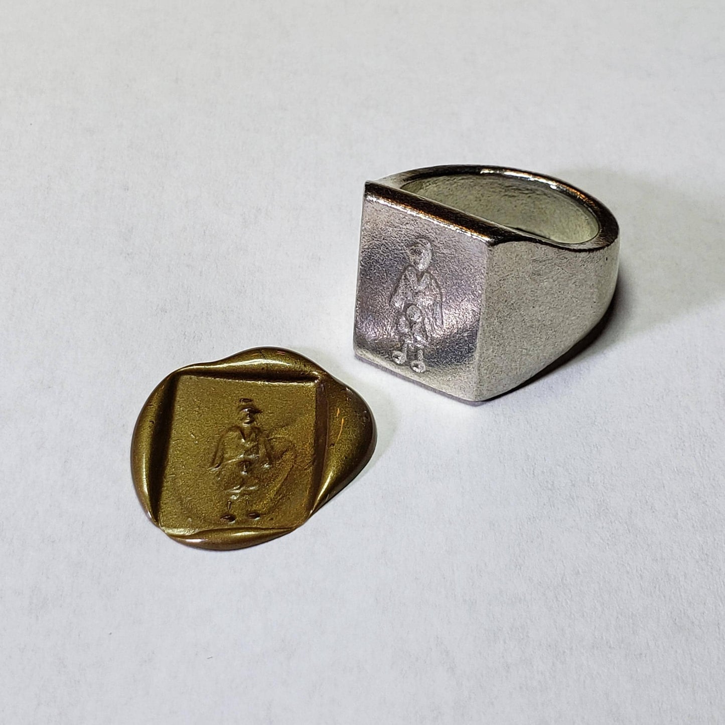 2 kids in a trench coat wax seal signet ring