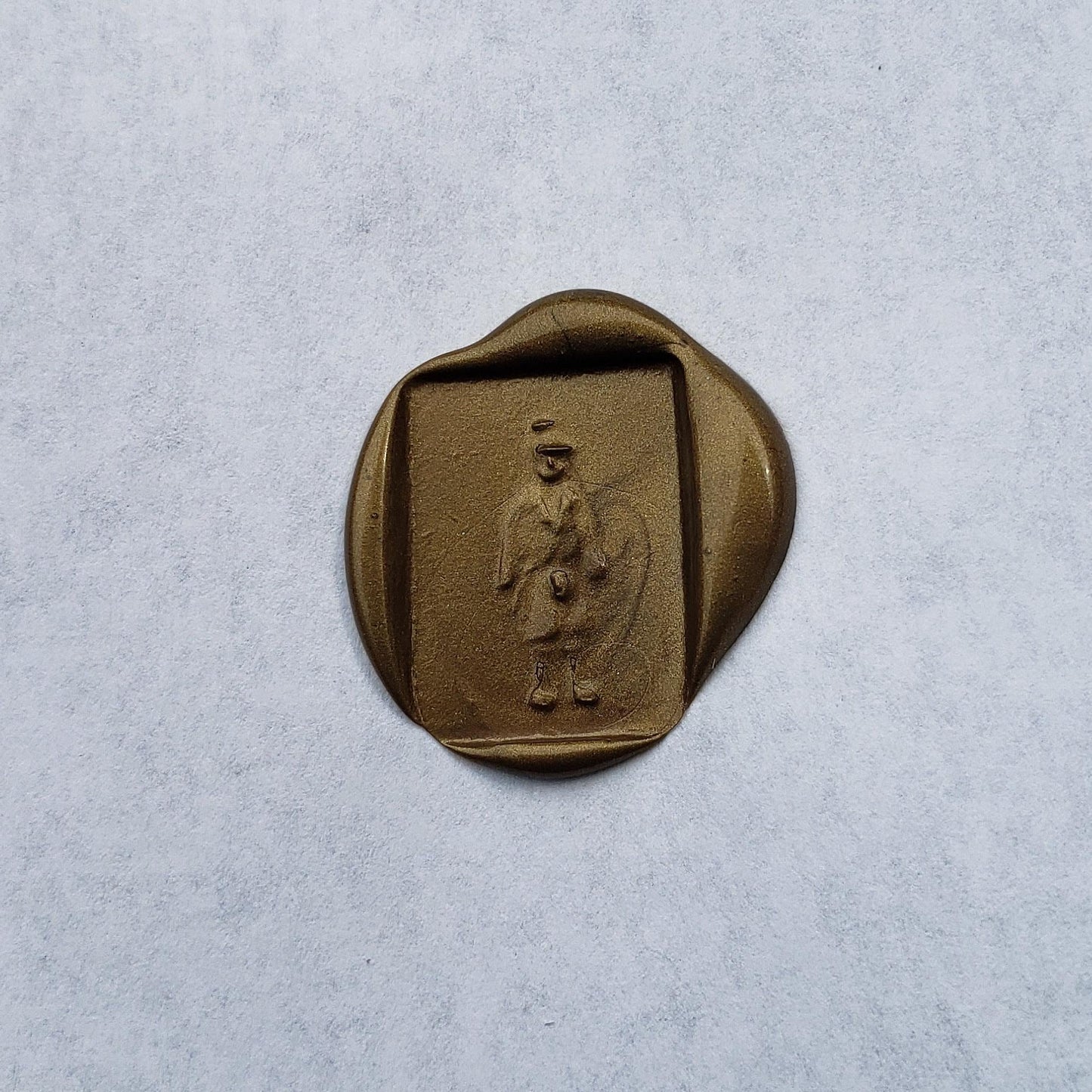 2 kids in a trench coat wax seal signet ring