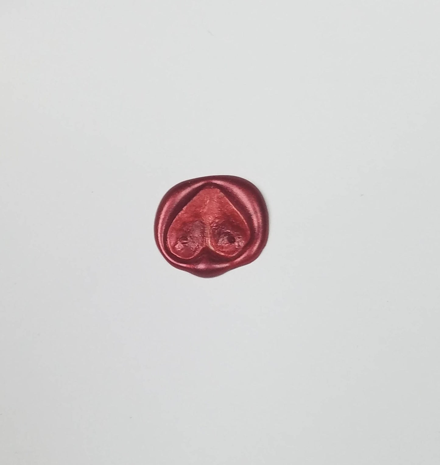 Loving mammaries (wax seal signet ring)