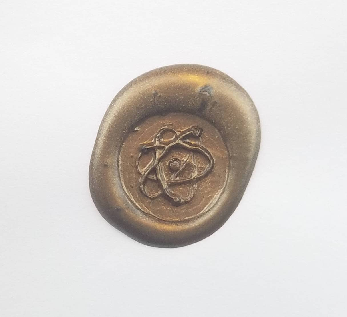 The power of the atom wax seal signet ring