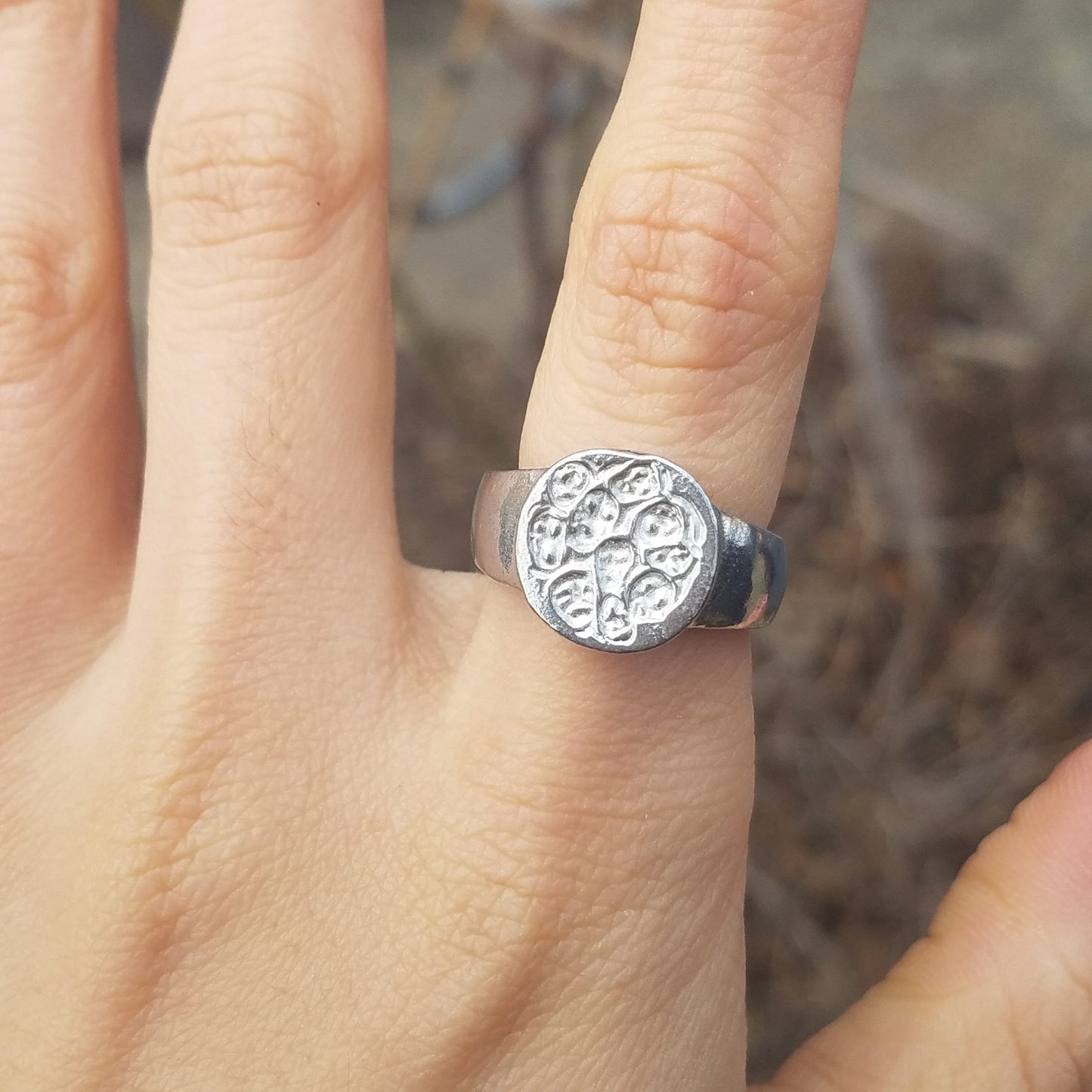 Trapped souls wax seal signet ring