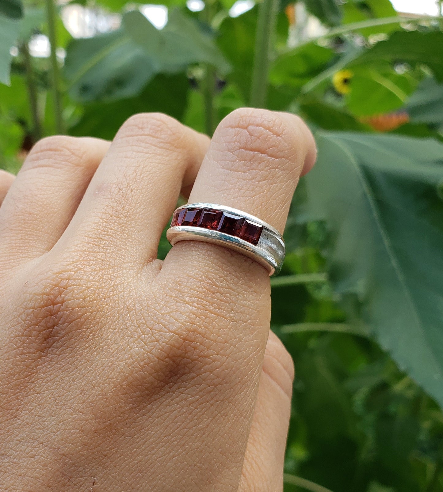 5 stone garnet channel ring