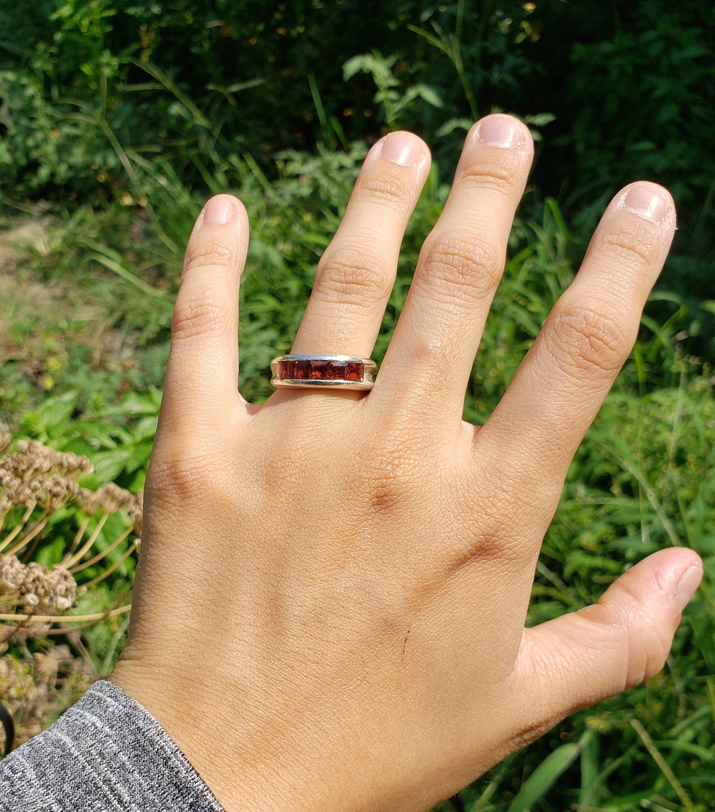 5 stone garnet channel ring