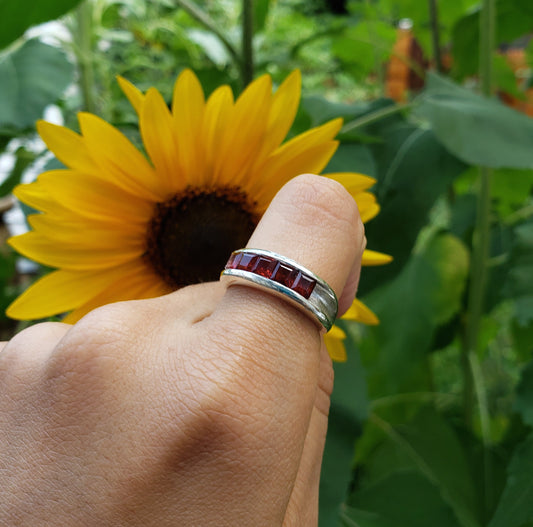 5 stone garnet channel ring