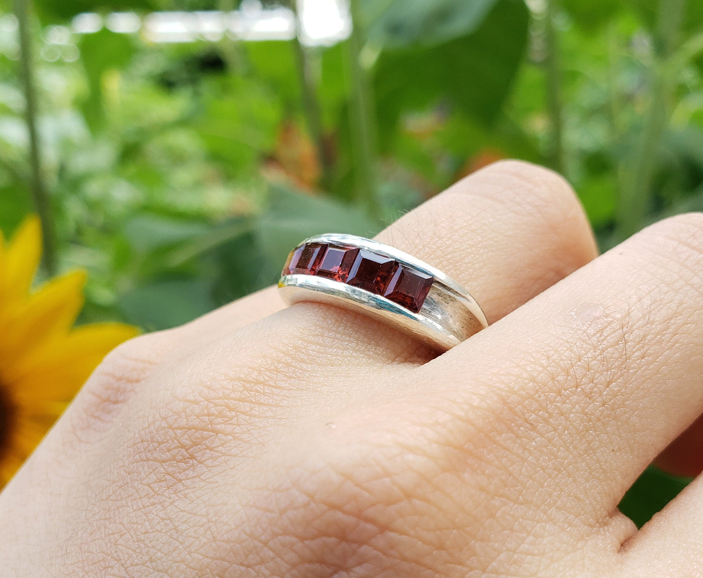 5 stone garnet channel ring