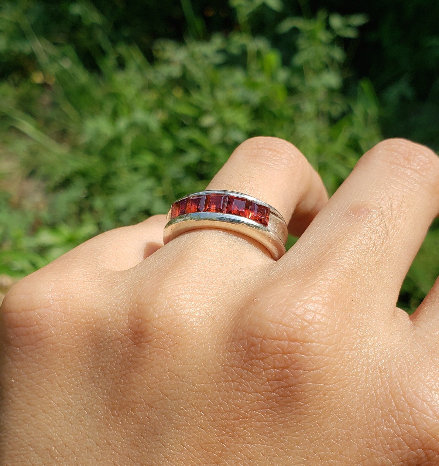 5 stone garnet channel ring