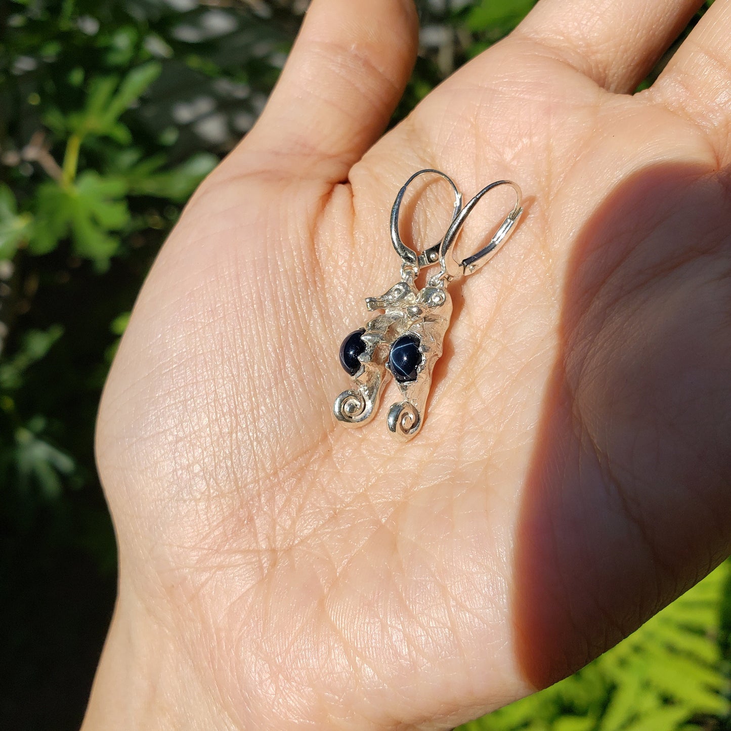 Star sapphire seahorse earrings