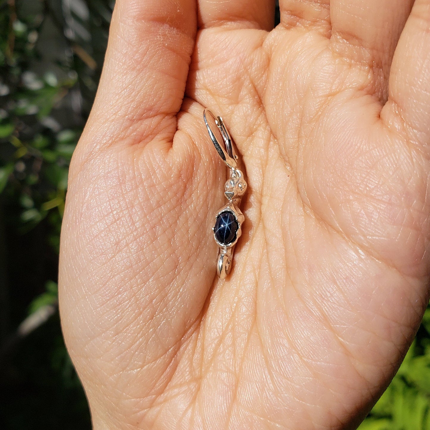 Star sapphire seahorse earrings