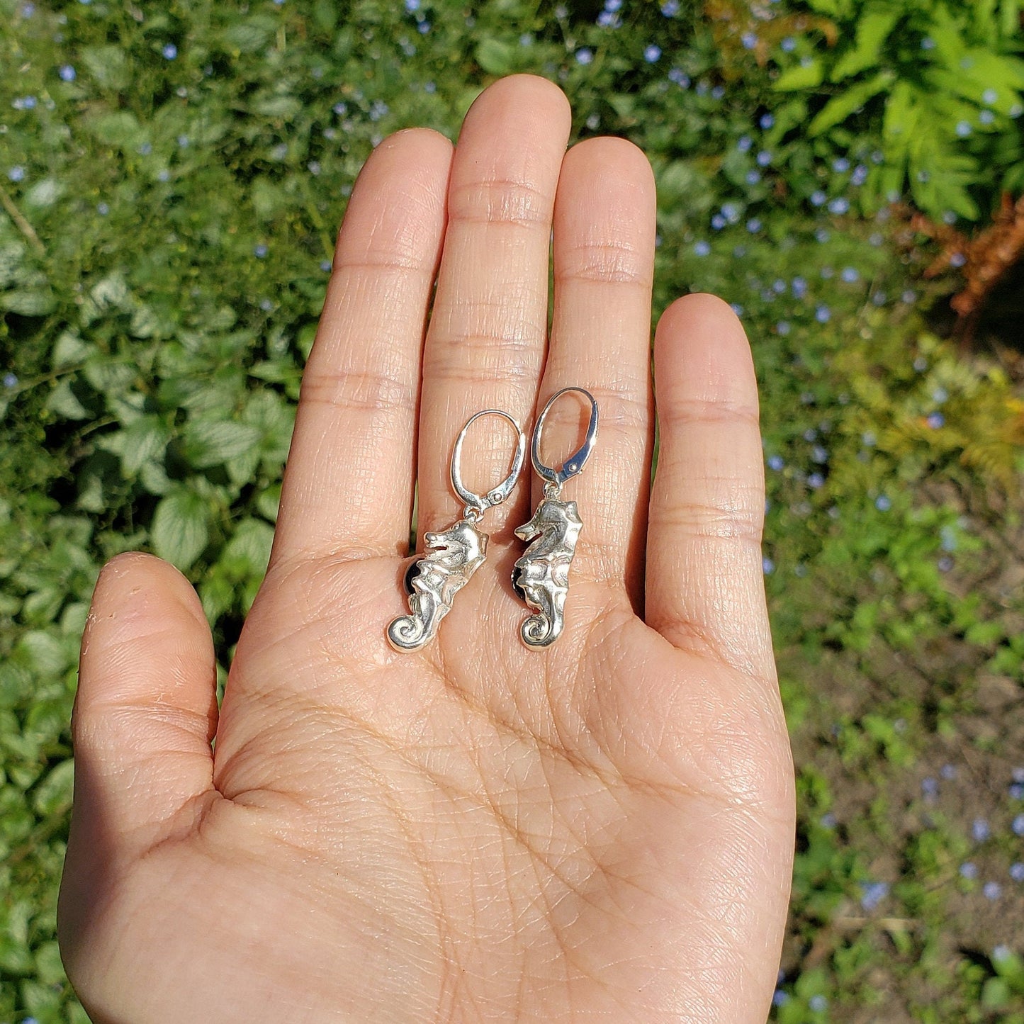 Star sapphire seahorse earrings