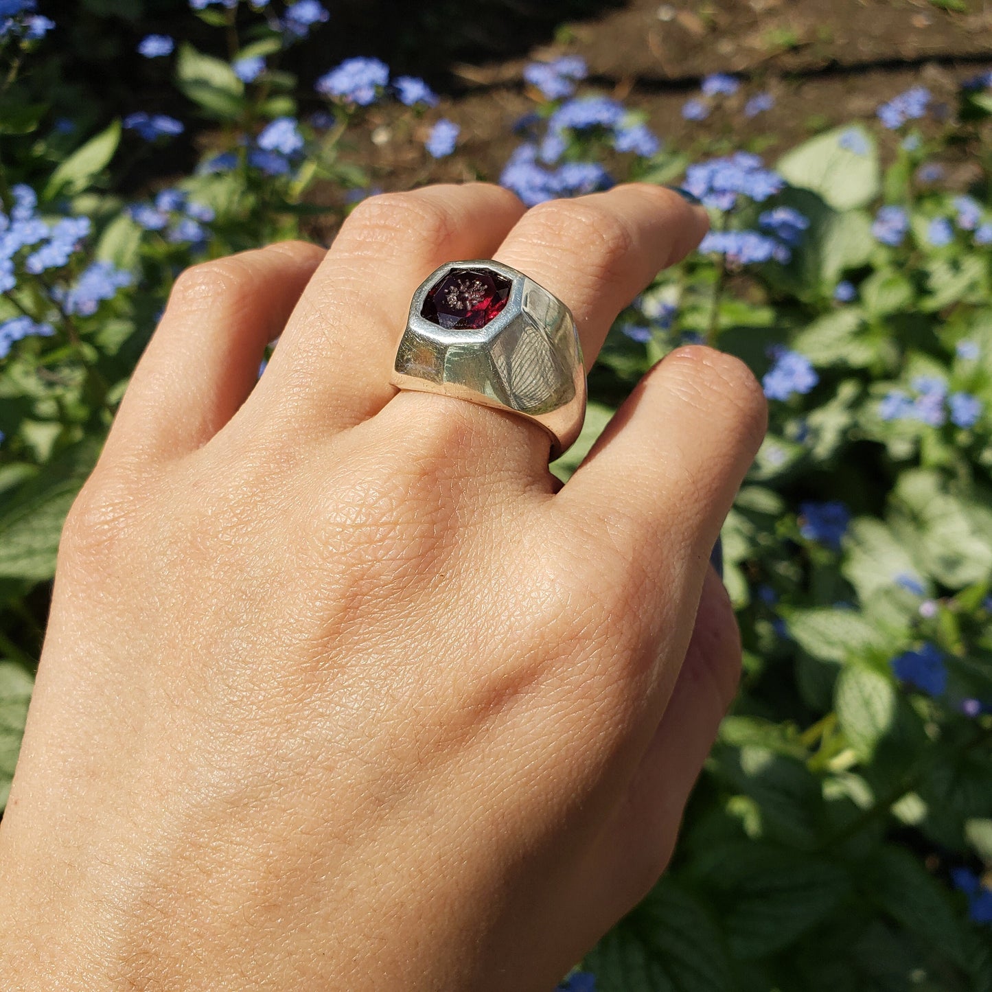 Radial flower garnet signet ring