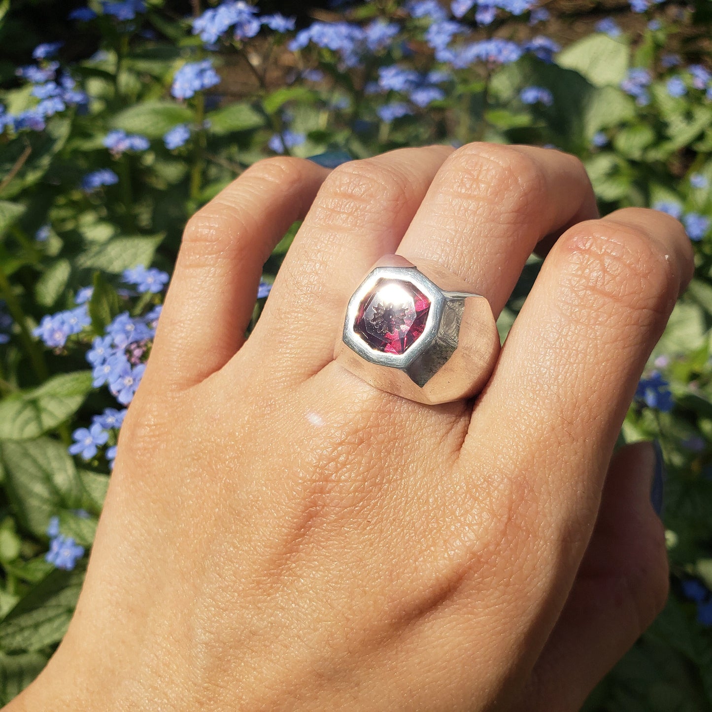 Radial flower garnet signet ring