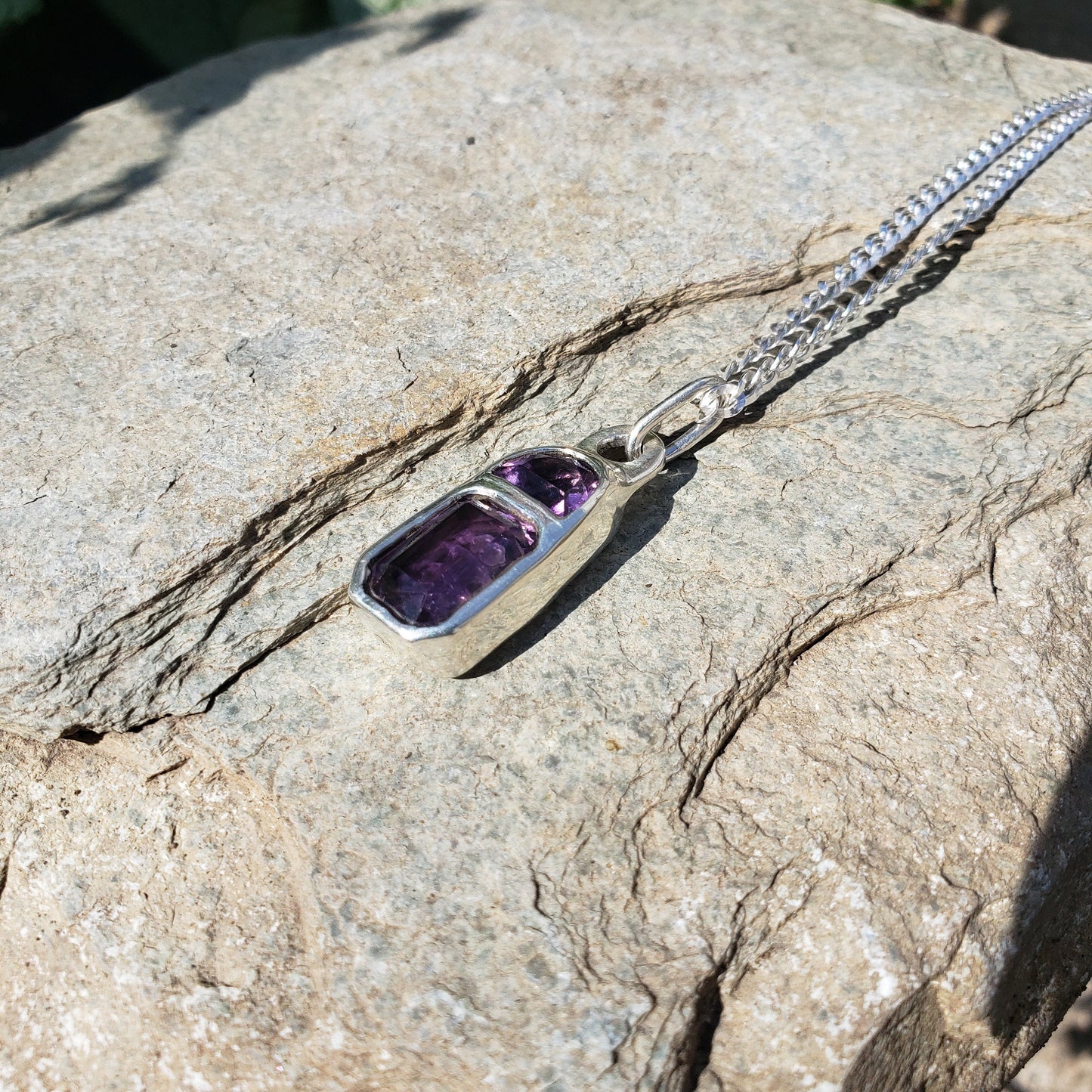 Reverse intaglio butt amethyst pendant