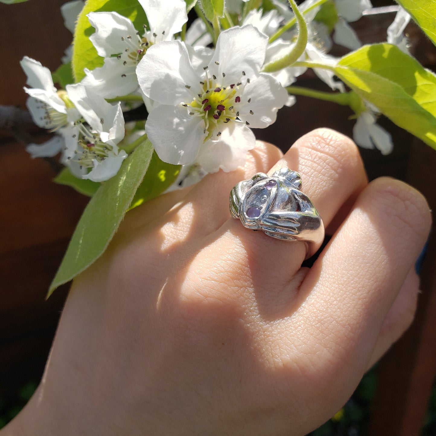 Pink sapphire and moonstone Vulva Claddagh ring