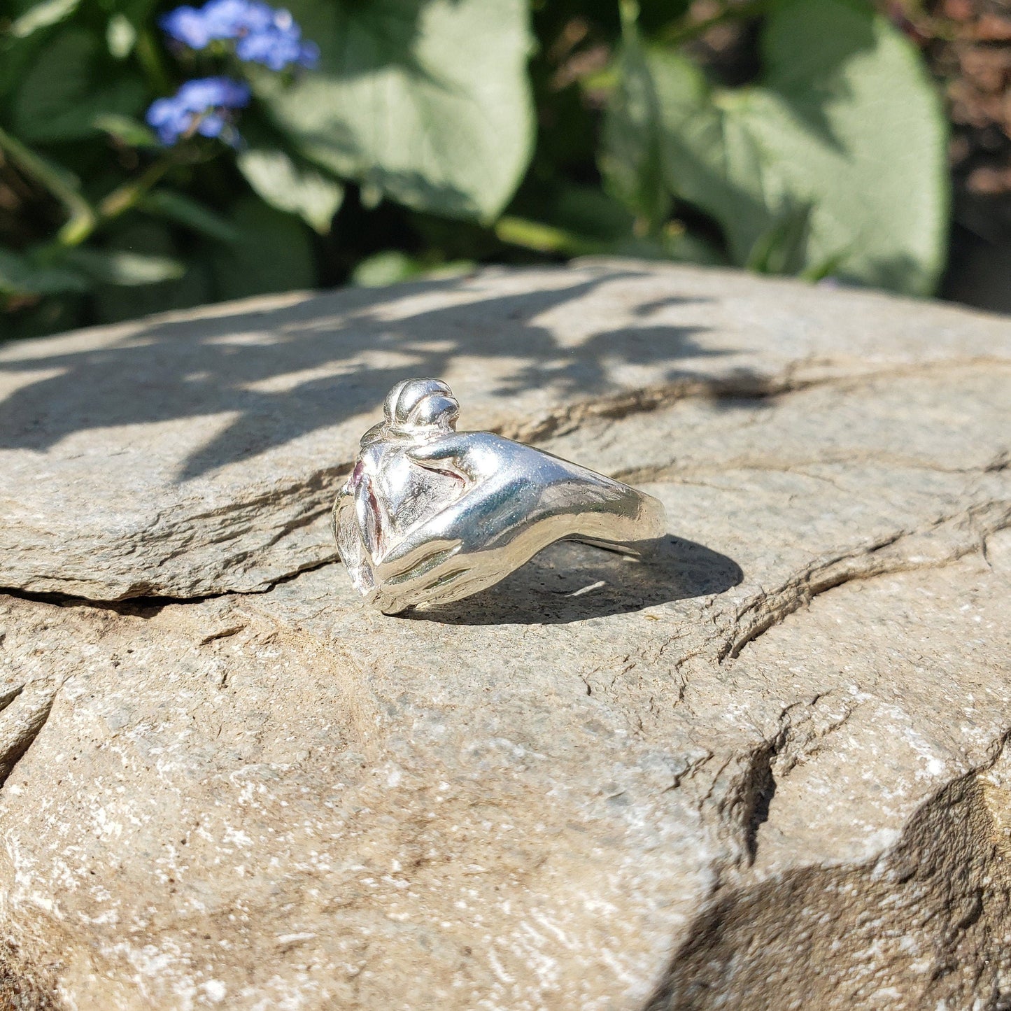 Pink sapphire and moonstone Vulva Claddagh ring