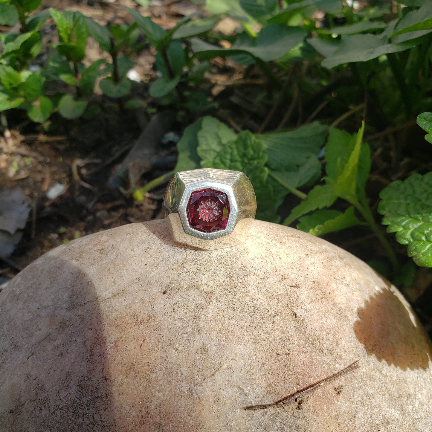 Radial flower garnet signet ring