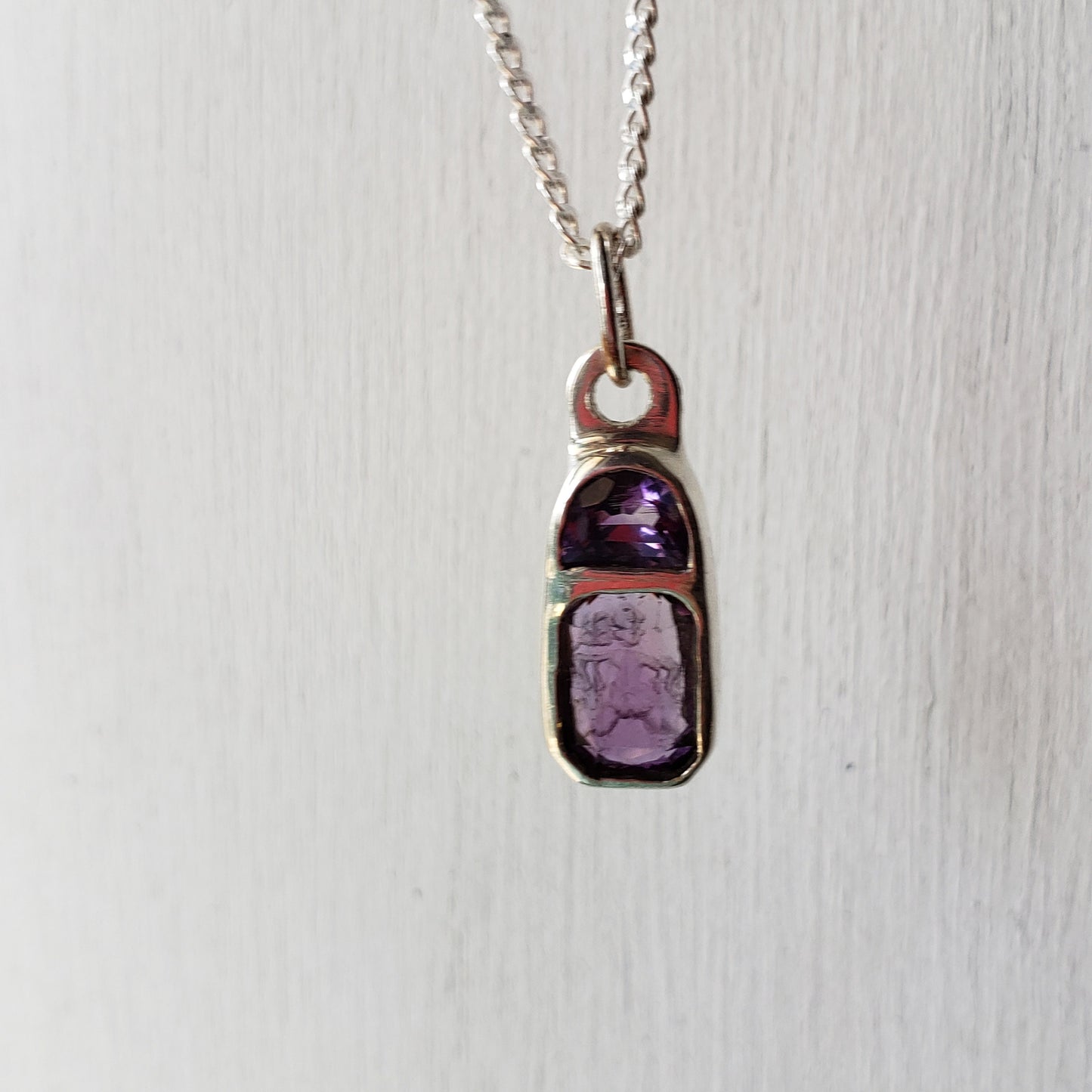 Reverse intaglio butt amethyst pendant