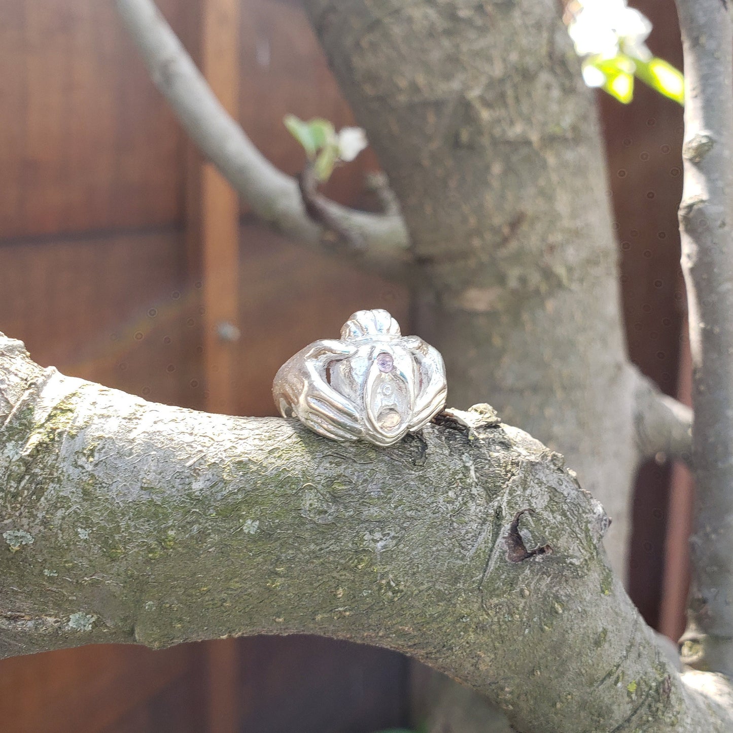 Pink sapphire and moonstone Vulva Claddagh ring