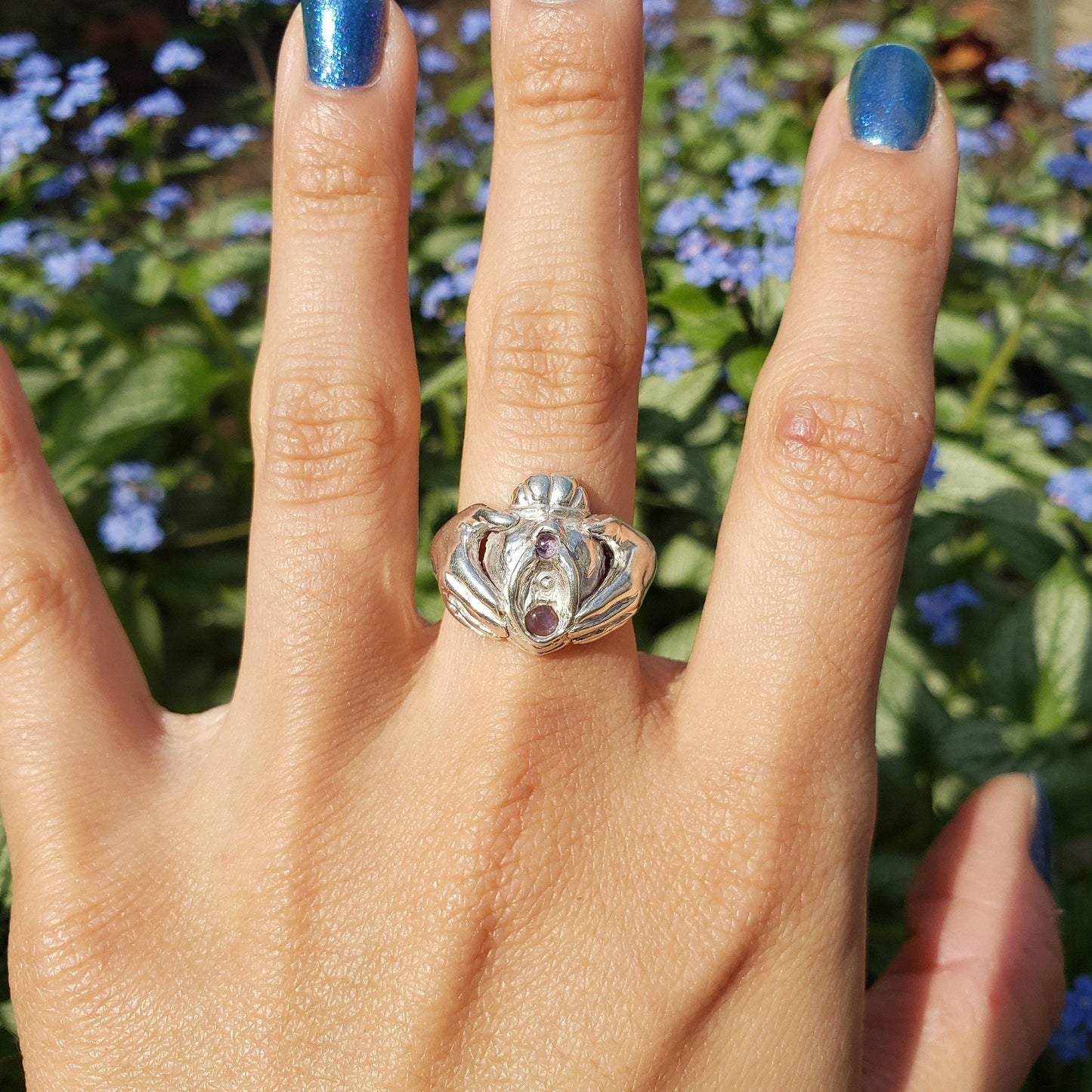 Pink sapphire and moonstone Vulva Claddagh ring