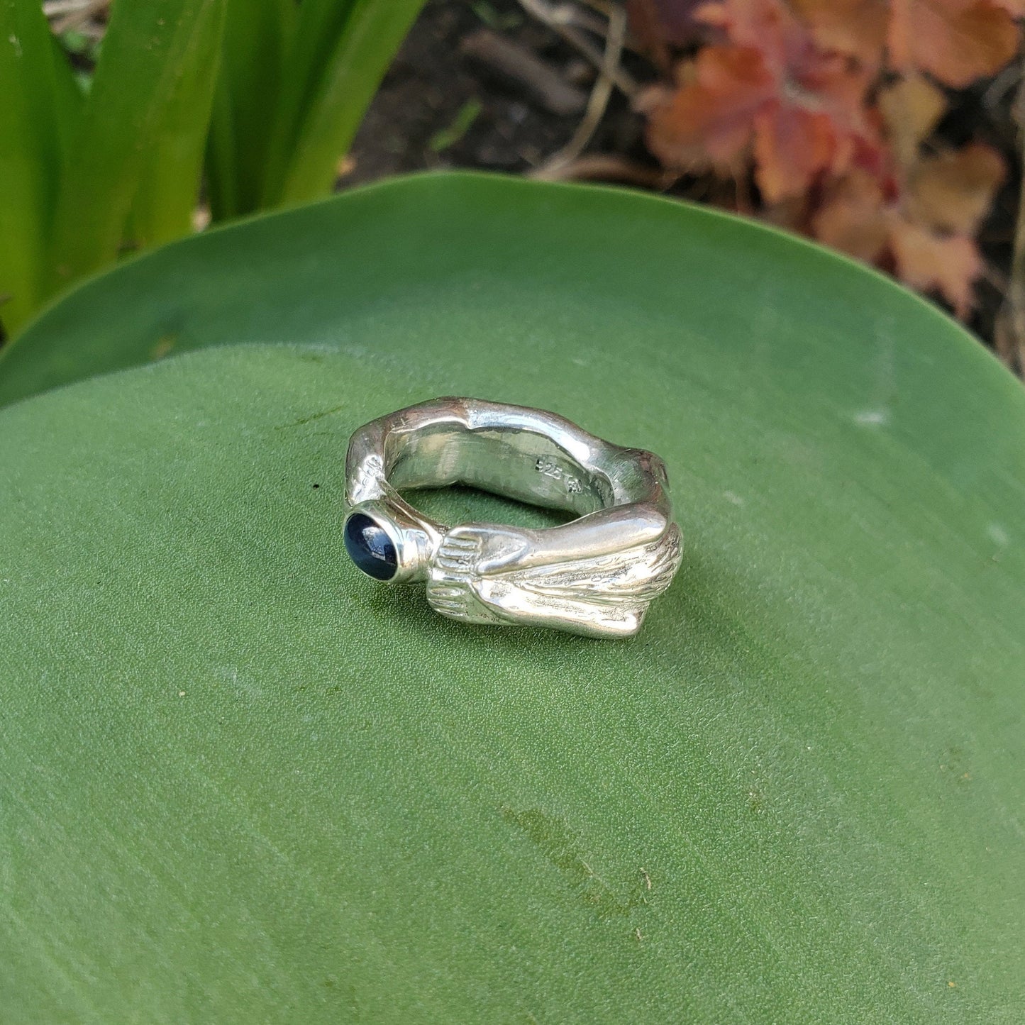 Blue star sapphire back bend ring