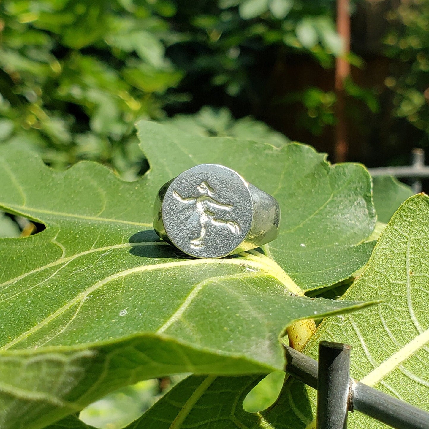 Ice skater wax seal signet ring