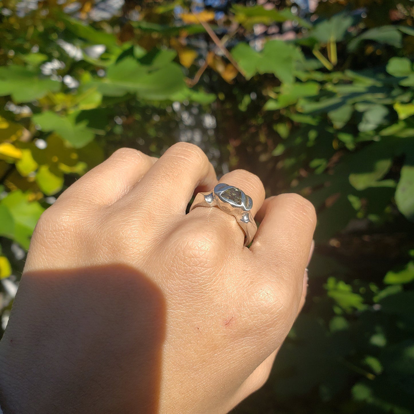 Green sapphire trilliant flower wing ring