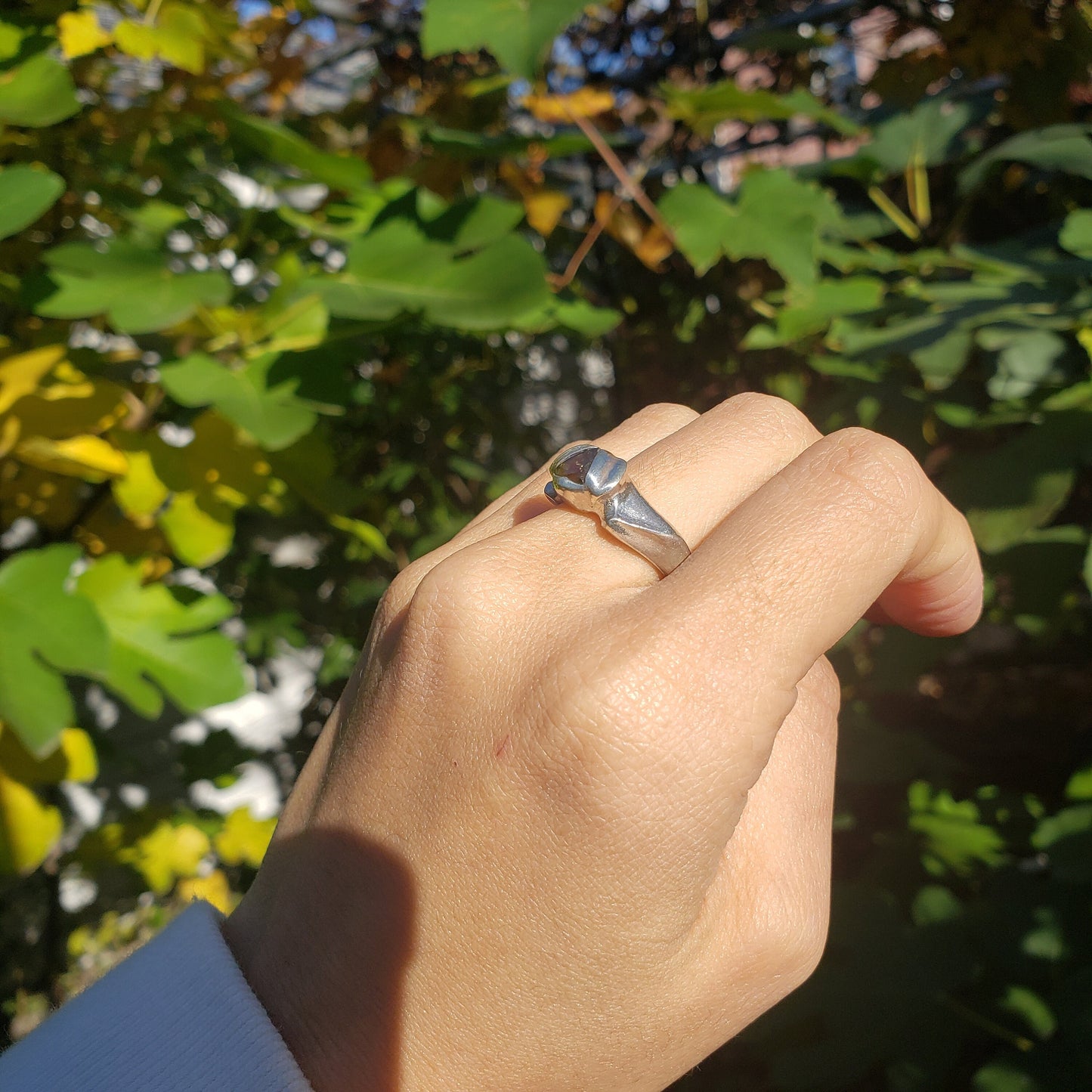 Green sapphire trilliant flower wing ring