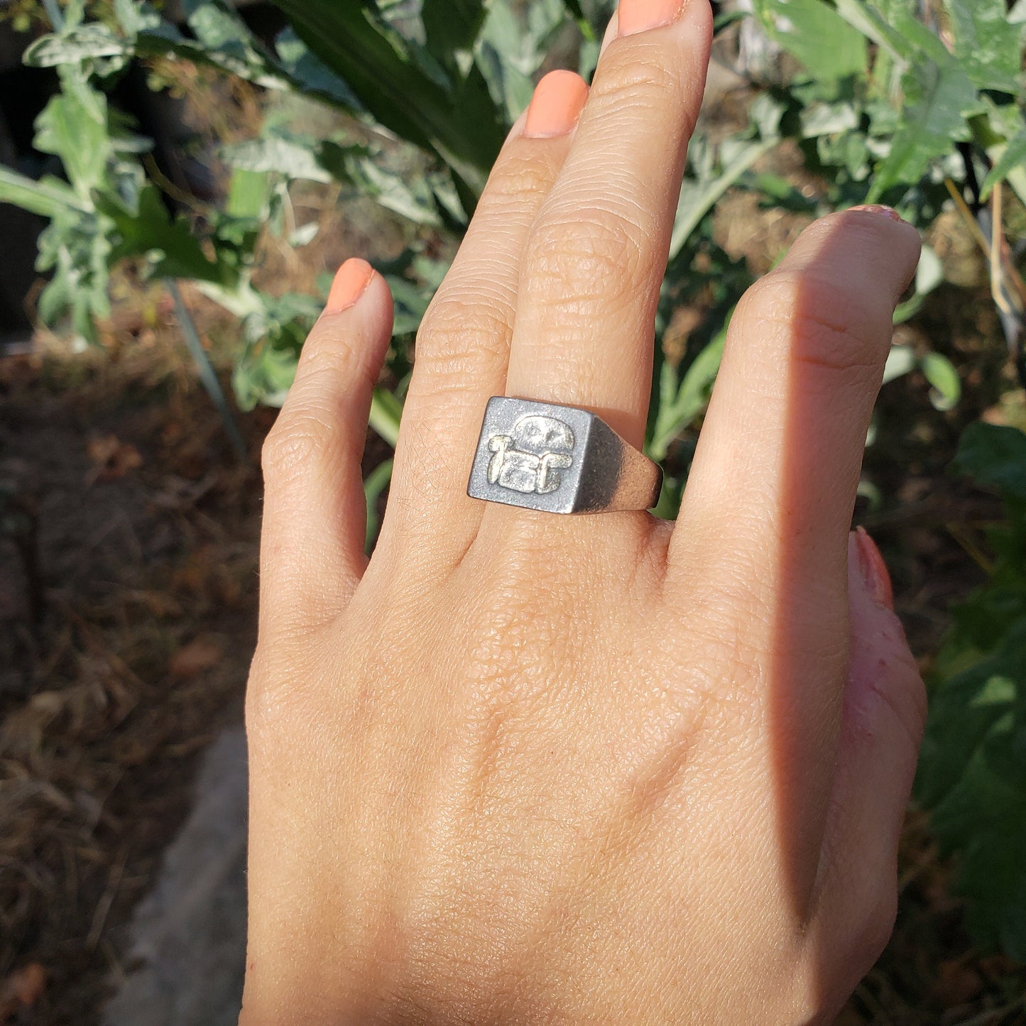 Lounge chair wax seal signet ring