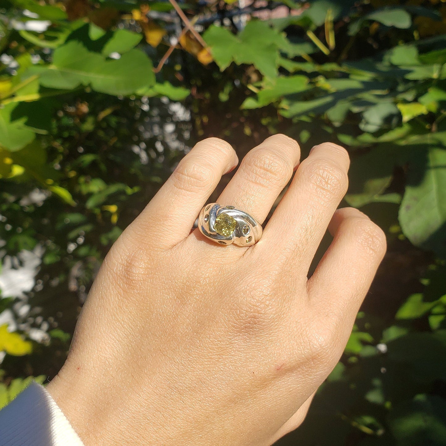 Yellow mali garnet cushion cut twist claw silver ring