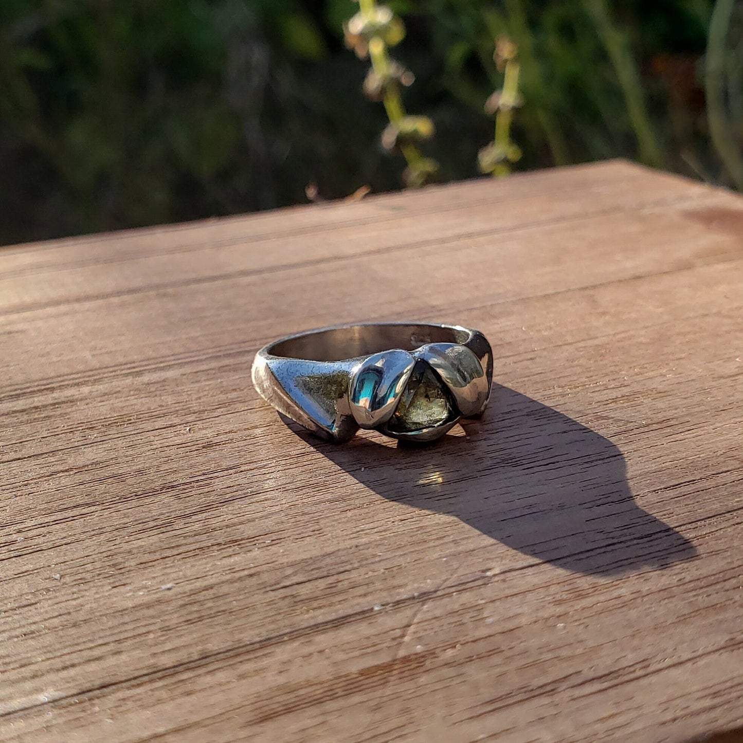 Green sapphire trilliant flower wing ring