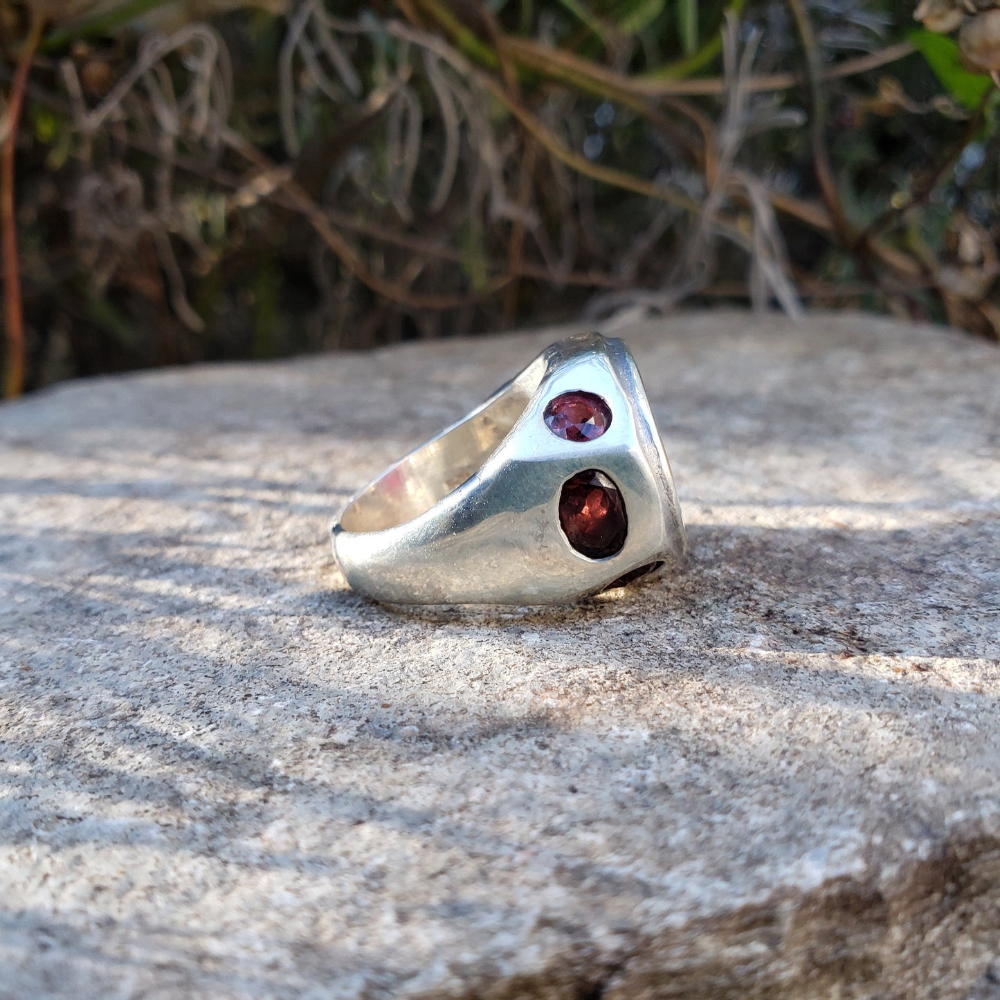 Headless horseman intaglio garnet signet ring